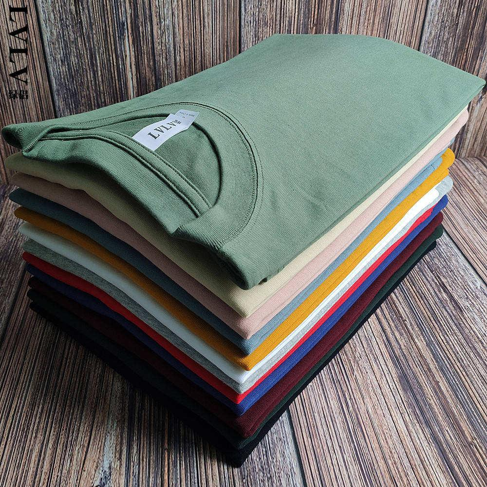 Folded stack of premium colour t-shirts